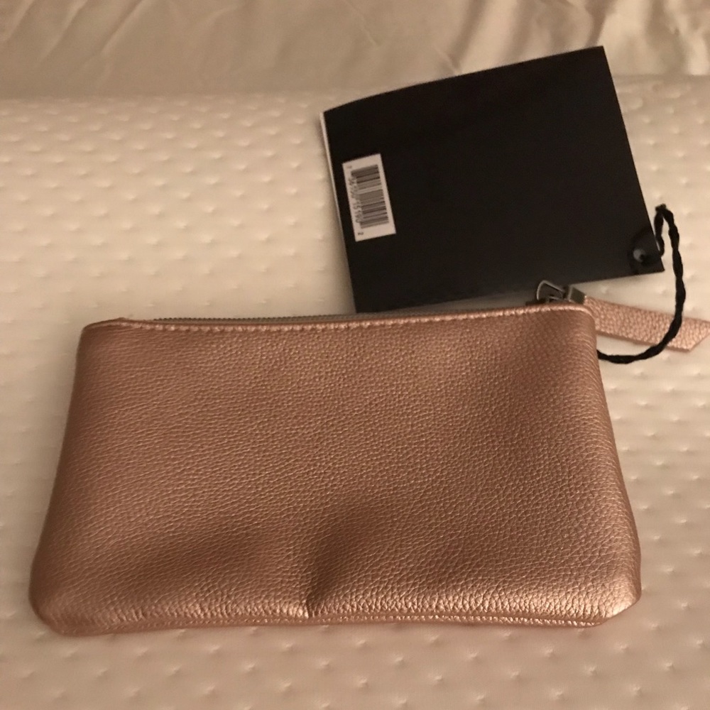Gold Laura Mercier Makeup Pouch